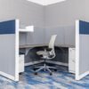 A full view of the refurbished Steelcase Answer Blue/Gray cubicle with blue accent panels and gray finishes.