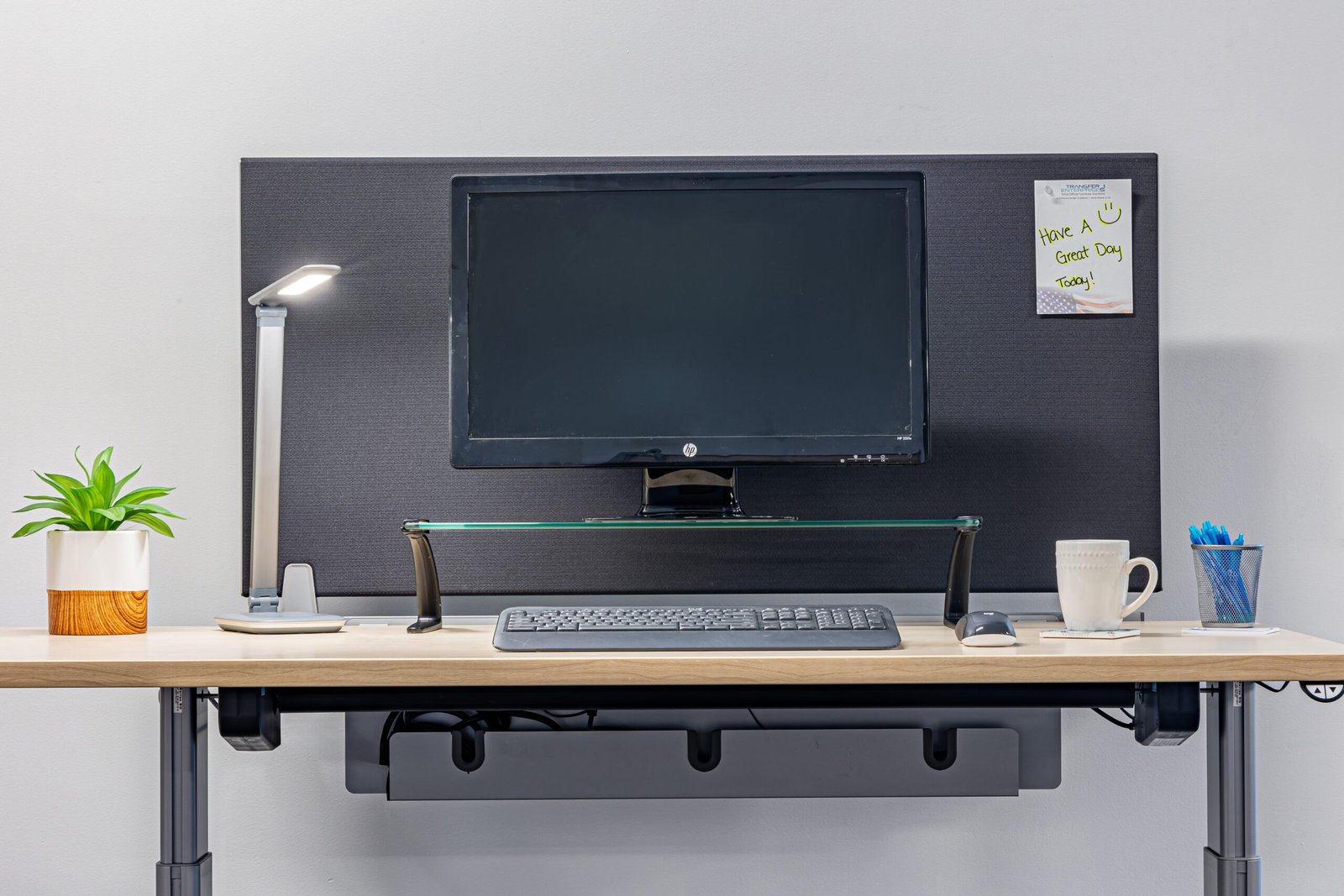 Ergonomic sit-stand desk setup promoting productivity and comfort in the workplace.