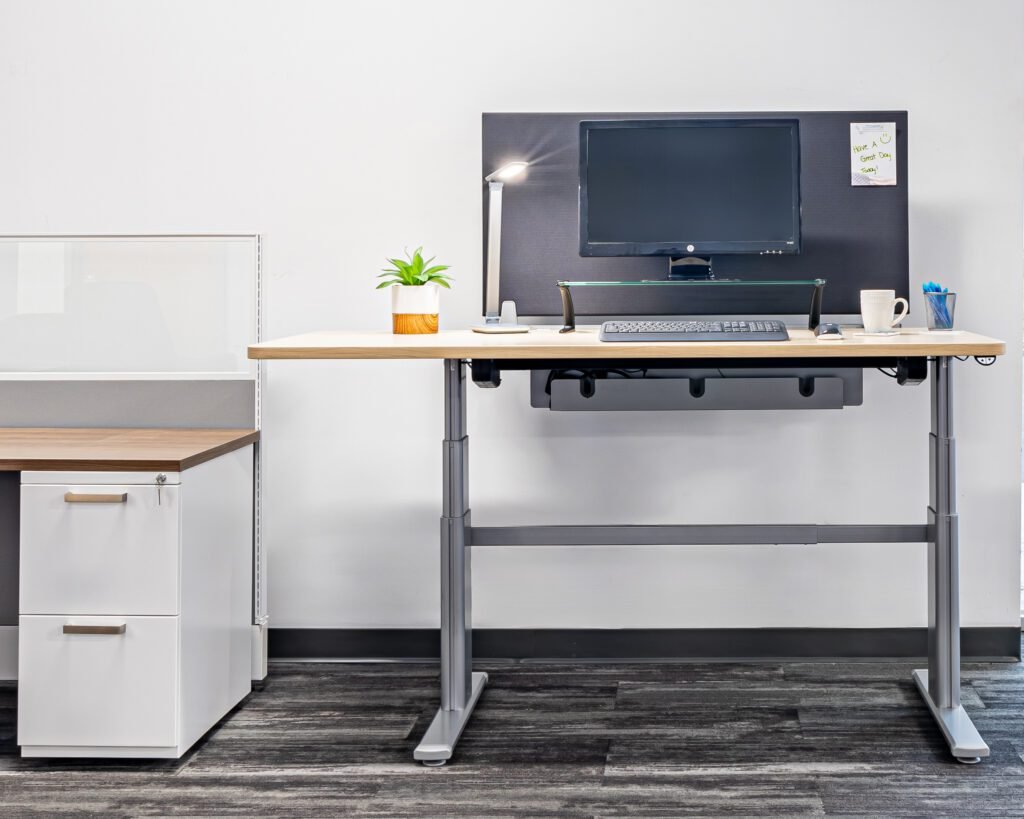 2-leg powered sit-stand desk with adjustable height for improved ergonomics and comfort